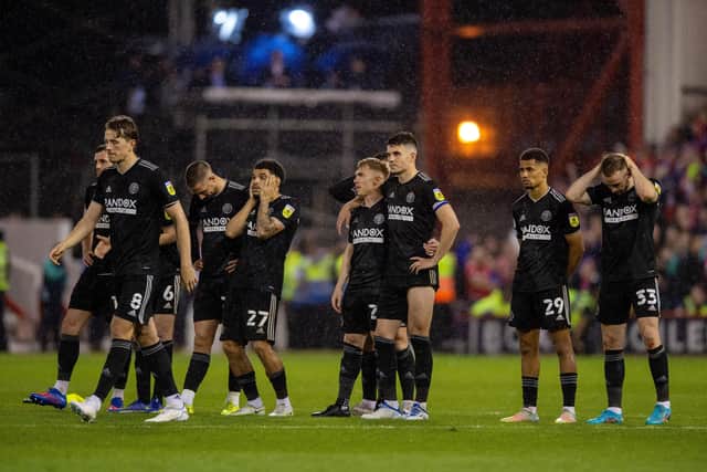 CRUEL BLOW: Sheffield United's players show their disappointment after their play-off semi-final defeat in a penalty shoot-out against Nottingham Forest at the City Ground on Tuesday night  Picture: Bruce Rollinson
