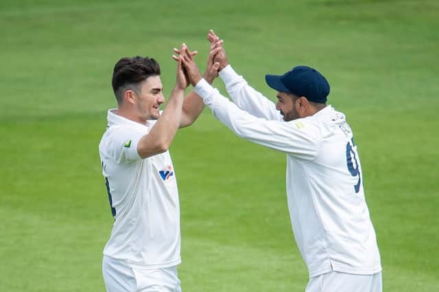 Busy bowlers: Yorkshire's Jordan Thompson is congratulated by Haris Rauf on dismissing Kent's Matthew Quinn (Picture: Allan McKenzie/SWPix.com)