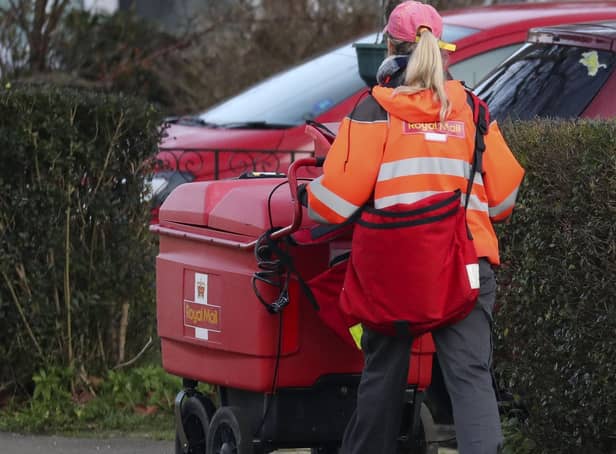 Royal Mail has said it will need to hike prices and slash costs to offset soaring inflation amid an “uncertain” outlook for the economy as it posted a rise in annual earnings.