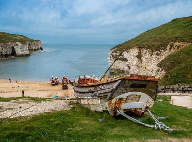 The remains of a old fishing Yorkshire Coble looks across the beach at North Landing at Flamborough, East Yorkshire. Photo: James Hardisty

Camera Details:
Camera, Nikon D4
Lens, Nikon 24-70mm
Shutter Speed, 1/500 sec
Aperture, f/8.0
ISO, 250