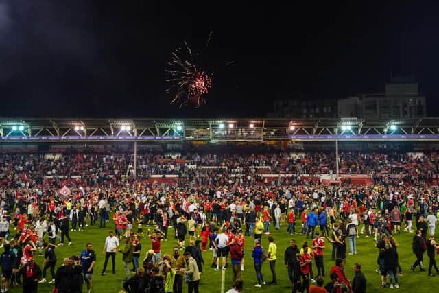 PITCH INVASION: At Nottingham Forest on Tuesday. Picture: PA Wire.