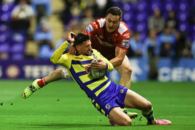 Brad Takairangi gets to grips with Gareth Widdop during last year's play-offs. (Picture: SWPix.com)