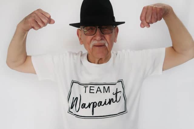 Arthur, 87, wears a Team Warpaint T-shirt.