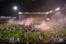 OVERFLOW: Nottingham Forest fans invade the pitch after winning the Championship Play-Off Semi Final against Sheffield United at the City Ground Picture: Michael Regan/Getty Images