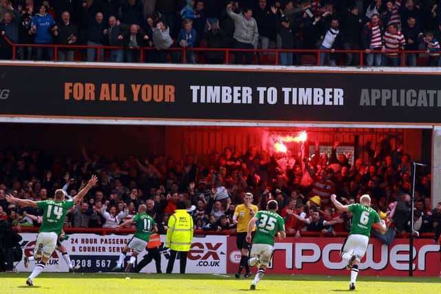 Doncaster Rovers' James Coppinger scores THAT goal after Marcello Trotta's penalty miss at Brentford back in 2012-13.