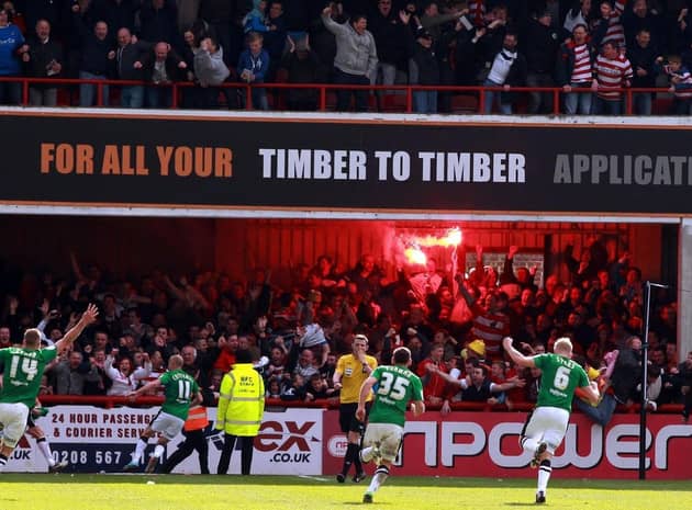 Doncaster Rovers' James Coppinger scores THAT goal after Marcello Trotta's penalty miss at Brentford back in 2012-13.