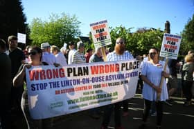 More than 100 protestors chanted “Wrong Plan, Wrong Place,” ahead of  a parish council meeting in the village attended by several civil servants and managers from security firm Serco, in a bid to allay a raft of concerns about launching the centre at the former RAF Linton on Ouse base on May 31.