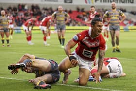 Salford Red Devils' Tim Lafai celebrates scoring the equalising try. Picture: Paul Currie/SWpix.com