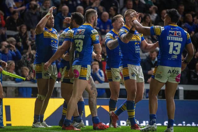 Leeds Rhinos celebrate David Fusitu'a's try. (Picture: Bruce Rollinson/YP)