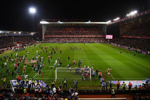 PITCH INVASION: At Nottingham Forest on Tuesday. Picture: Getty Images.