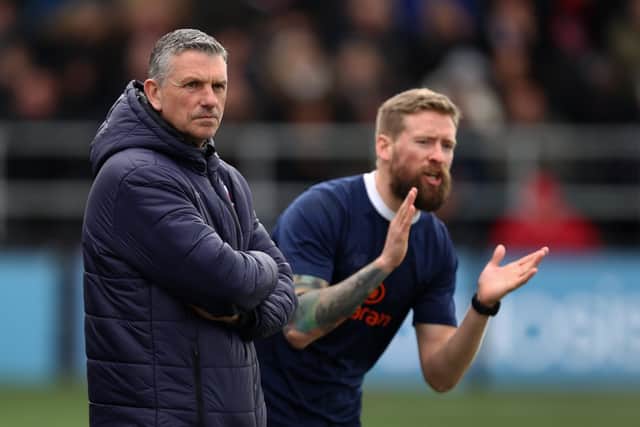 Rising to the occasion: John Askey, left, inherited a team down on its luck in York City but now one win from promotion. (Picture: Getty Images)