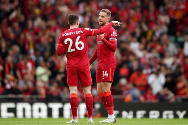 Liverpool's Andrew Robertson (left) and Jordan Henderson during the Premier League match at Anfield (Picture: PA)