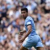 Manchester City's Rodrigo runs to celebrate after scoring his side's second goal (AP Photo/Dave Thompson)