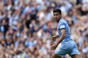 Manchester City's Rodrigo runs to celebrate after scoring his side's second goal (AP Photo/Dave Thompson)