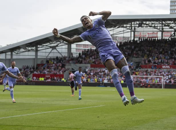 leeds have lift off: Raphinha goes airbourne after scoring from the penalty spot, left, to put Leeds United in the ascendency at Brentford. (Picture: Tony Johnson)