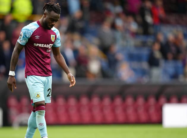 Burnley's Maxwel Cornet reacts to relegation to the Sky Bet Championship following the Premier League match at Turf Moor (Picture: PA)