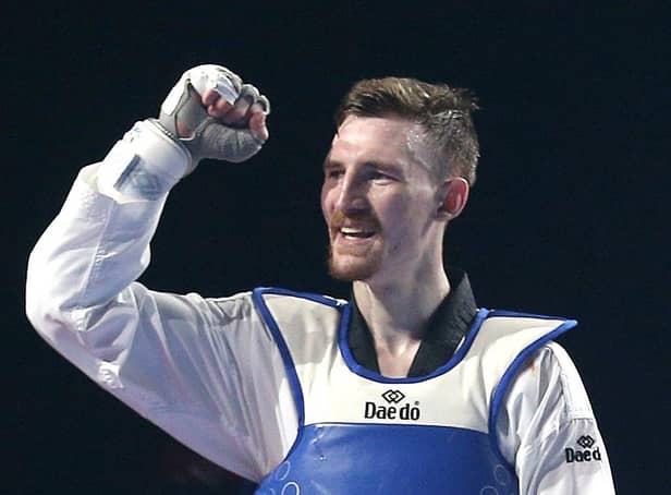 Great Britain's Bradly Sinden (Blue) celebrates after beating Spain's Javier Perez Polo (Red) during day three of the European Taekwondo Championships 2022 at the Manchester Regional Arena (Picture: Nigel French/PA Wire)