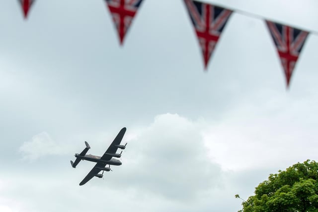 The Lancaster Bomber flies over Haworth.