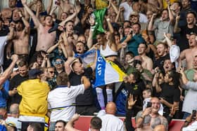 FOND FAREWELL? Raphinha celebrates with Leeds United fans at the end of what could well prove to be his last game for the club, at Brentford