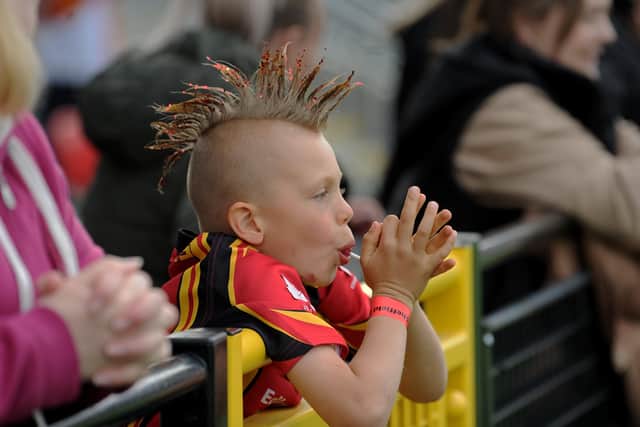 A young Sheffield Eagles fan watches the match. Picture: Simon Hulme