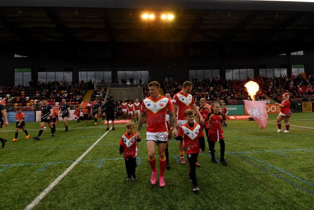 Sheffield Eagles' Anthony Thackeray leads the team out at their new home. Pictures: Simon Hulme