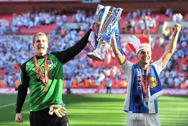 Huddersfield Town's Alex Smithies (left) and Jack Hunt celebrate promotion to the Championship after beating Sheffiel;d United on penalties in 2012 League One final (Picture: PA)