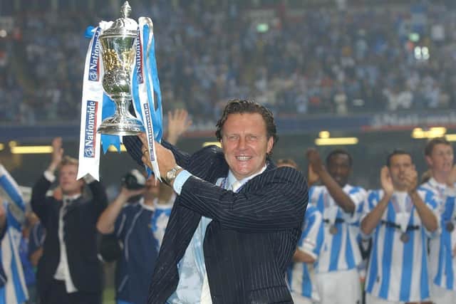 Huddersfield Town manager Peter Jackson celebrates promotion after beating Mansfield Town on a penalty shoot out in the Nationwide Division Three play-off final Monday May 31, 2004, at the Millennium Stadium in Cardiff (Picture: PA)