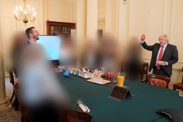 Prime Minister Boris Johnson (right) at a gathering in the Cabinet Room in 10 Downing Street on his birthday. Photo dated: 19/06/20.