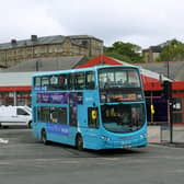 An Arriva bus leaves Dewsbury heading for Leeds