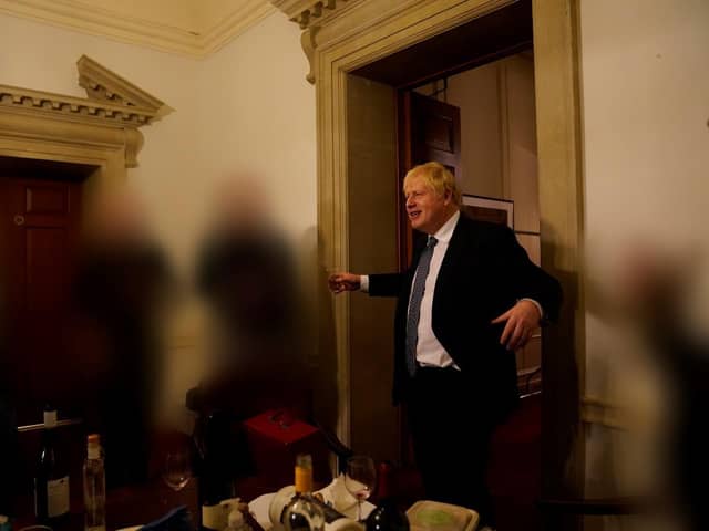 Handout photo dated 13/11/20 issued by the Cabinet Office showing Prime Minister Boris Johnson at a gathering in 10 Downing Street