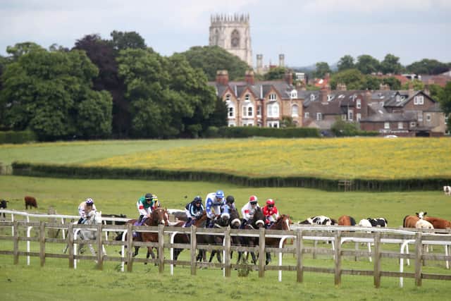 Runners and riders during the Racing TV Apprentice Handicap at Beverley Racecourse.  Pictures: Simon Marper/PA  .