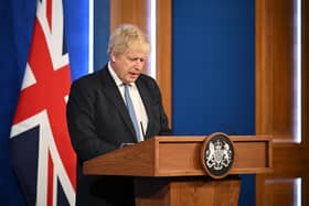 Prime Minister Boris Johnson speaks during a press conference in Downing Street, London
