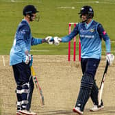 Vikings' Harry Brook and  Joe Root tap as their partnership takes them to victory. Picture: Tony Johnson