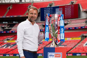 Former Huddersfield Town striker Marcus Stewart - pictured with the Championship play-off trophy Picture courtesy of  Andrew Fosker/Shutterstock