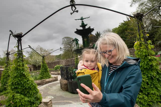 Cassandra Kitchin, from Morecambe, with her granddaughter, Angelica Walker, using the new app at The Forbidden Corner.