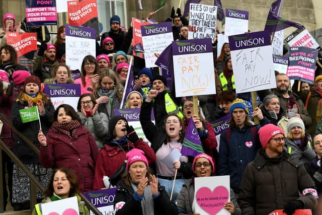 Members of Unison and staff at Leeds University on strike outside Leeds University Leeds earlier this year.
