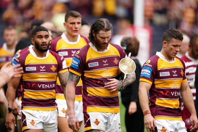 Huddersfield Giants' Chris McQueen (centre) reacts to defeat in the Challenge Cup final to Wigan Warriors at the Tottenham Hotspur Stadium Picture: Mike Egerton/PA