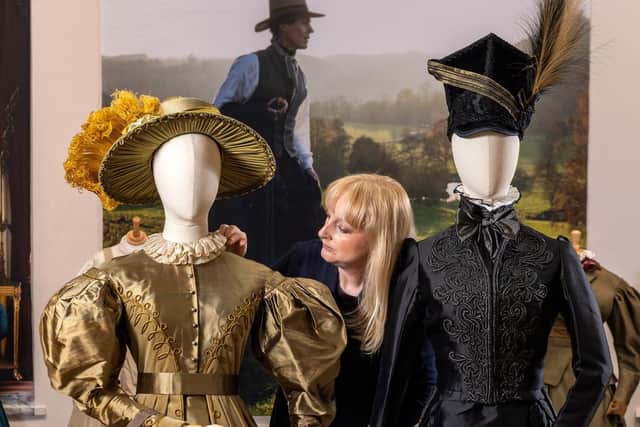 Exhibition of costumes from BBC's Gentleman Jack series 2, opening May 31 at the Bankfield Museum, Halifax. Elinor Camille-Wood, collections curator, puts the finishing touches to costumes of  Ann Walker and Anne Lister from the finale episode. Picture Bruce Rollinson
