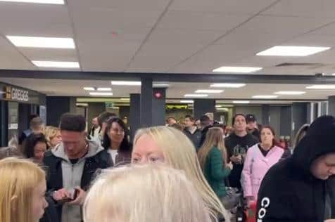 The video shows huge queues at the airport