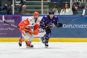 END OF AN ERA: Matt Haywood (right) battles with Sheffield Steelers' Evan Mosey while playing for Glasgow Clan last season Picture courtesy of EIHL/Al Goold