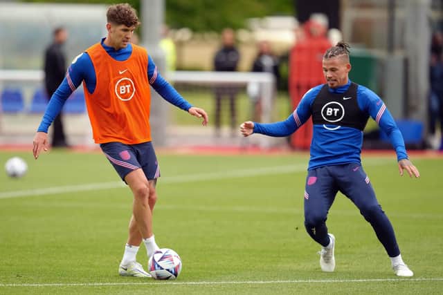 Yorkshire pride: Leeds United's Kalvin Phillips (right) and Manchester City's former Barnsley defender John Stones training for England. Picture: Nick Potts/PA Wire.