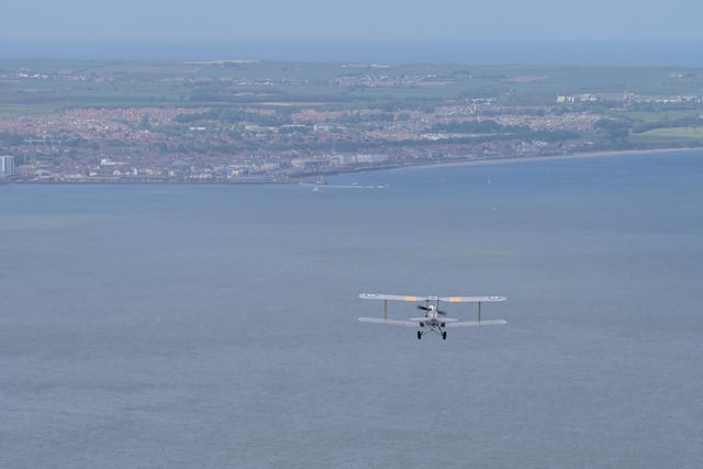 The Tiger Moth flight will show you stunning views of the Yorkshire coast
