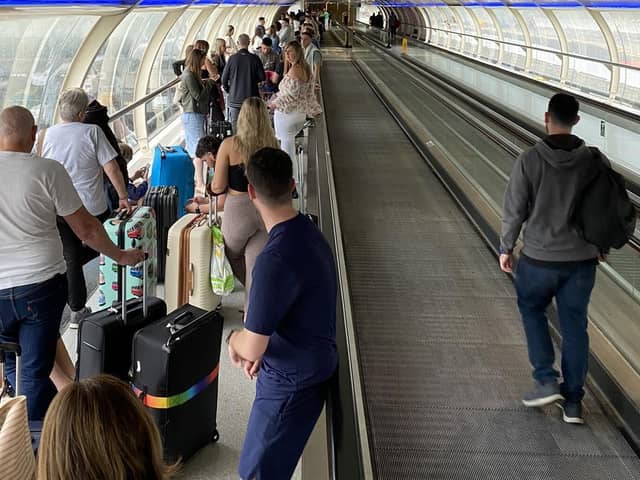 Photo from the Twitter feed of @chrisjprice67 of people queuing at Manchester Airport on Monday May 30