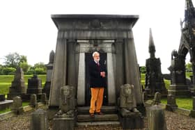The trust's chair Allan Hilary outside the Illingworth tomb, which was disturbed in the 1980s and the granite sphinxes dislodged