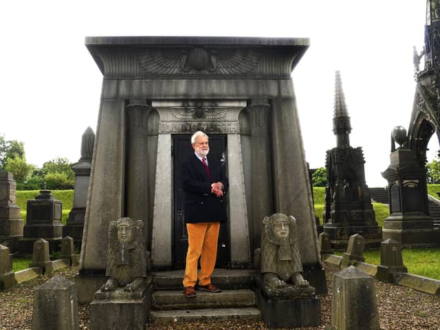 The trust's chair Allan Hilary outside the Illingworth tomb, which was disturbed in the 1980s and the granite sphinxes dislodged