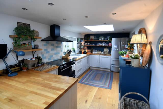 John and Becca Farrar, knocked through to create the kitchen-diner at Heron Barn, the home they bought five years ago, near Sowerby Bridge.