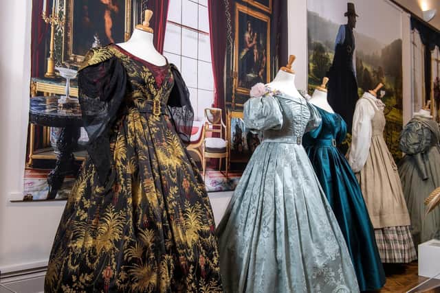 Exhibition of costumes from BBC's Gentleman Jack series at the Bankfield Museum, Halifax. Marianna Lawton's evening gown is at the front. Picture Bruce Rollinson