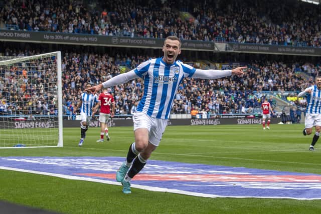 GOING NOWHERE: Left-back Harry Toffolo will remain with Huddersfield town next season. Picture: Tony Johnson