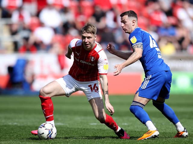 STICKING AROUND: Rotherham United's Jamie Lindsay (left). Picture: Isaac Parkin/PA