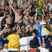 CELEBRATIONS: Raphinha joins in with the Leeds United away fans after playing a goalscoring part in their win at Brentford, which could prove his final appearance